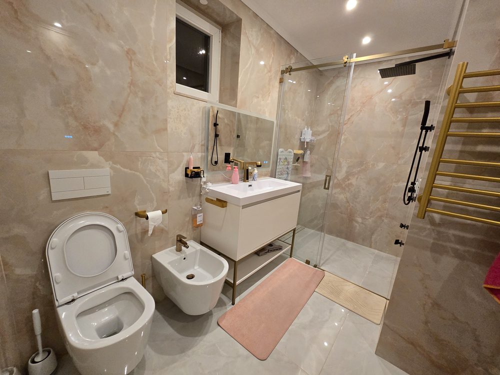Gold fixtures bathroom